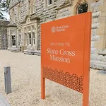 The Violet Stone Cross Mansion